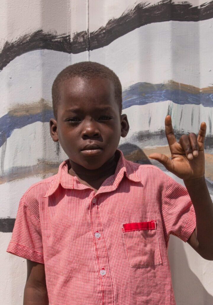 Kerbendjy is a special day student with sickle cell disease. He is quite and shy, but mighty lovable. We manage all of his medical care, and without constant medical supervision he would not make it. He gets special one on one tutoring right now and has shown tremendous progress in his language skills. 