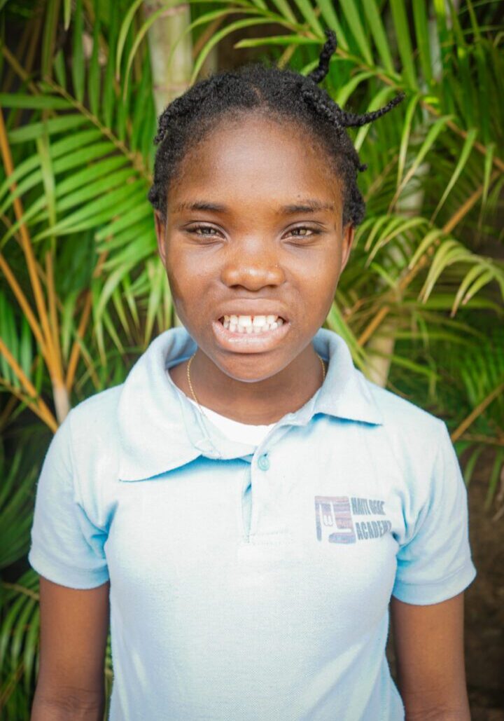 Loudia is spunky! She lives with her Grandmother in Cabaret. Her mother lives in PAP and she visits with her. Loudia suffers from seizures and some behavior problems. She is well liked, but all the kids know not to make her mad!